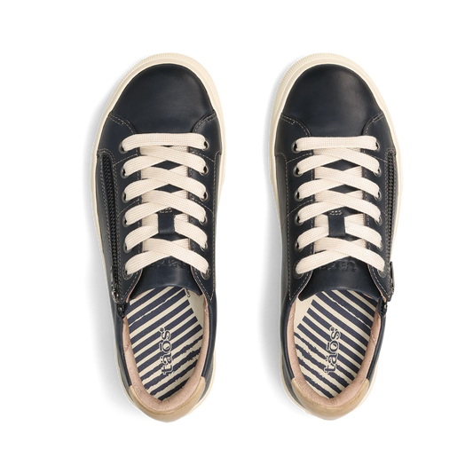Pair of navy sneakers with white laces on a white background