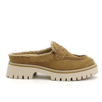 Tan slip-on shoe with a thick sole on a white background