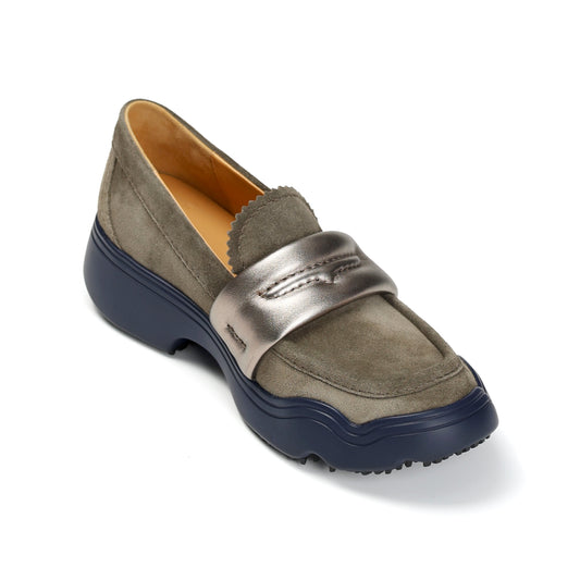 Loafer shoe with metallic buckle on a white background