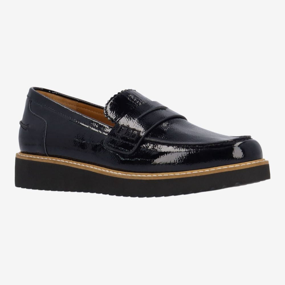 Black patent leather loafer on a white background