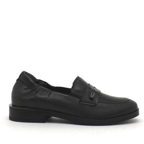 Black loafer shoe on a white background