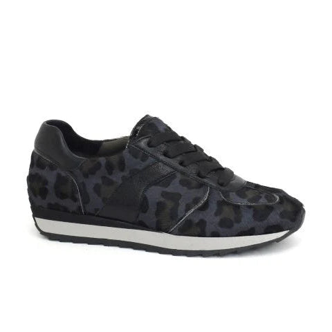 Black sneaker with leopard print pattern on a white background