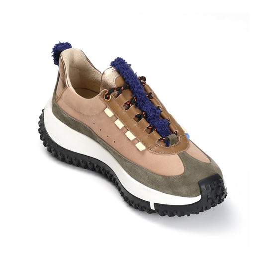Multicolored sneaker with blue accents on a white background