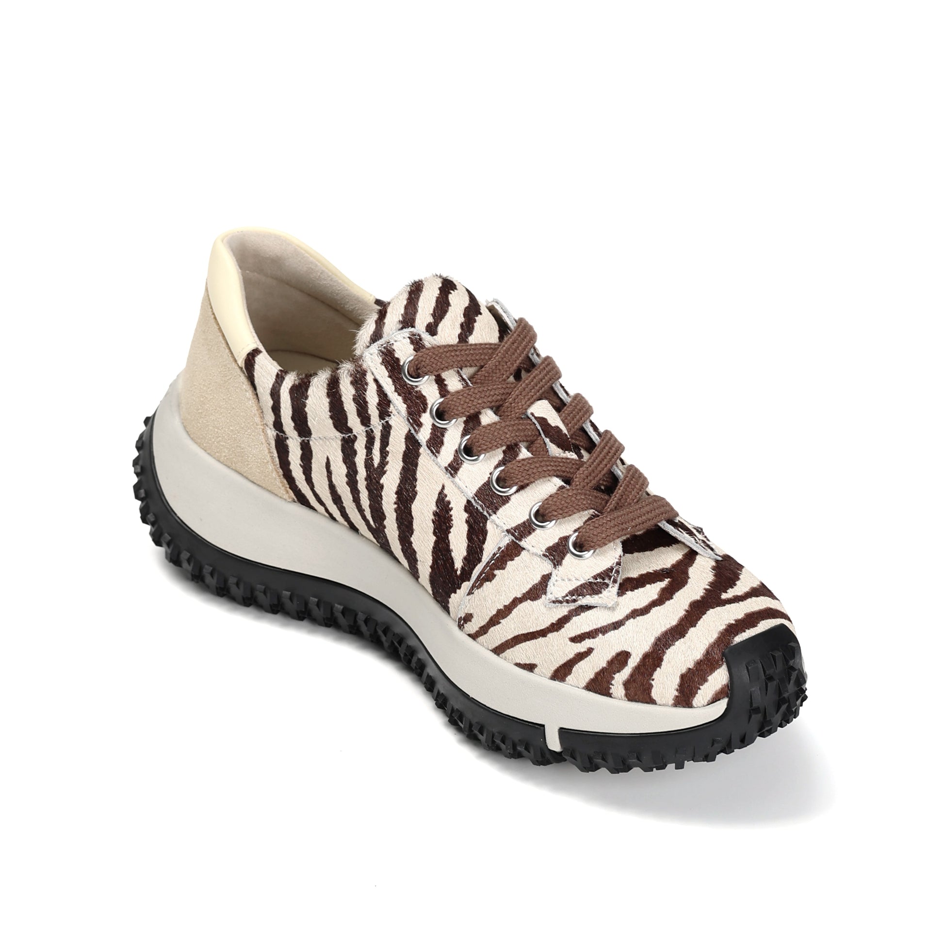 Sneaker with zebra pattern on a white background