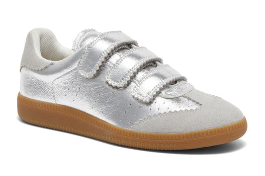 Silver sneaker with brown sole on a white background