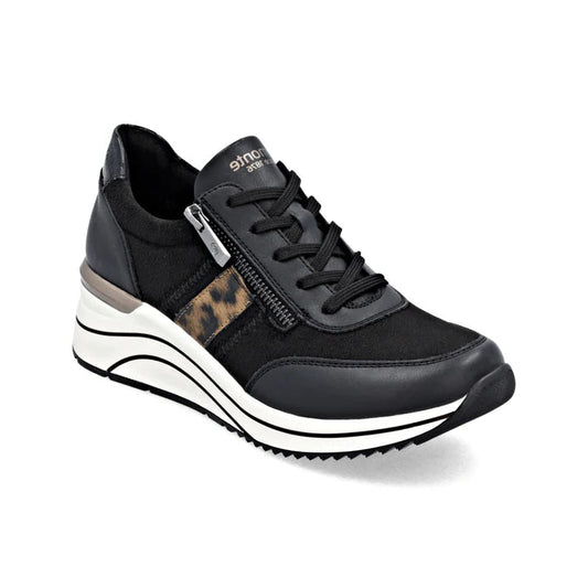 Black sneaker with leopard print detail on a white background